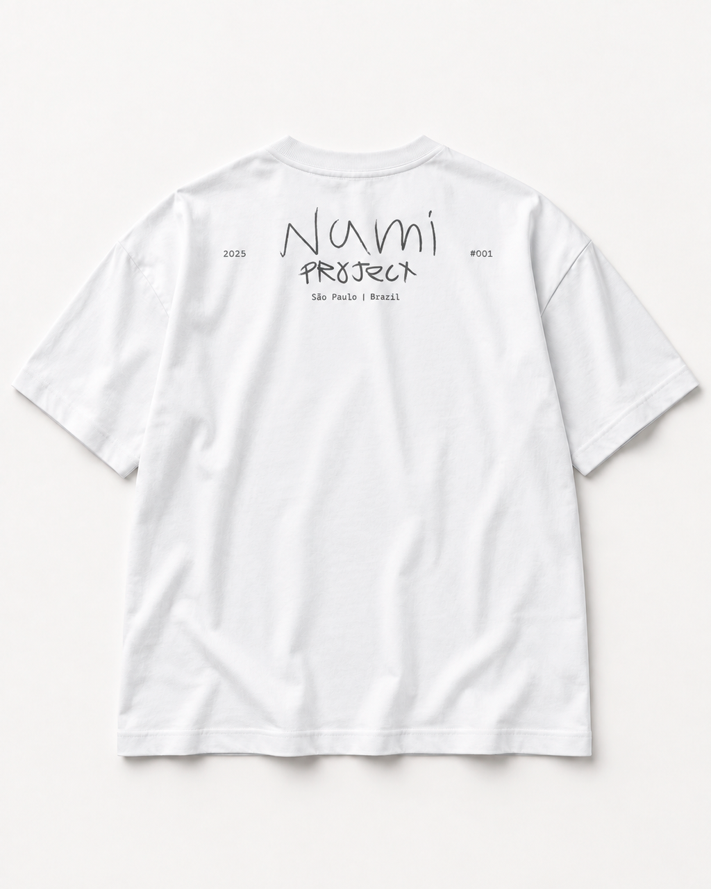 Camiseta God Always First branca — vista traseira com assinatura Nami Project